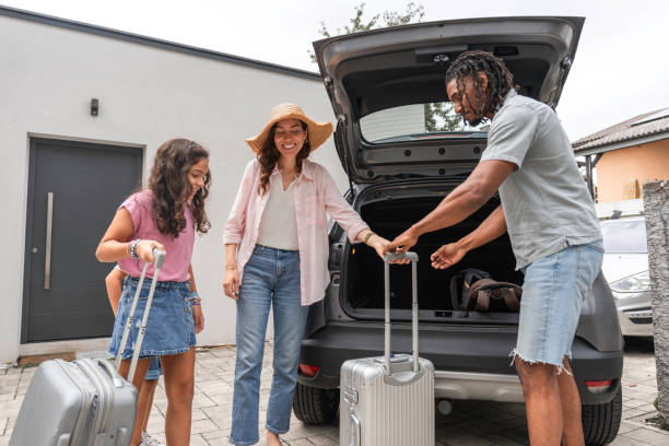 istock Diverse Family Prepares for Road Trip Adventure 2166530706