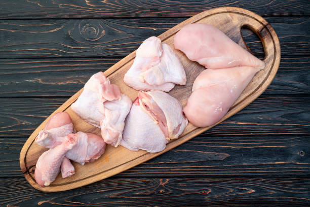 istock Raw mixed chicken meat parts  for cooking on rustic background 2166531171
