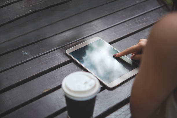 Astanbul, Turkey - September 5, 2011: Womans hands holding an Apple iPad displaying The New York Times. The New York Times is an American daily newspaper founded and continuously published in New York City since 1851. The iPad is produced by Apple Computer, Inc.