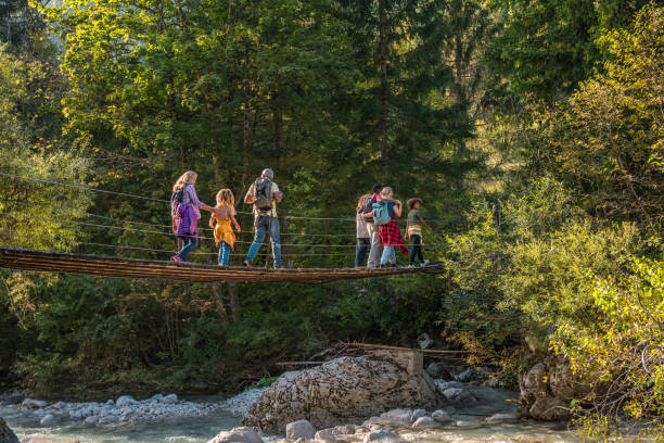 istock Multigenerational Family Adventure on Forest Bridge 2166532569
