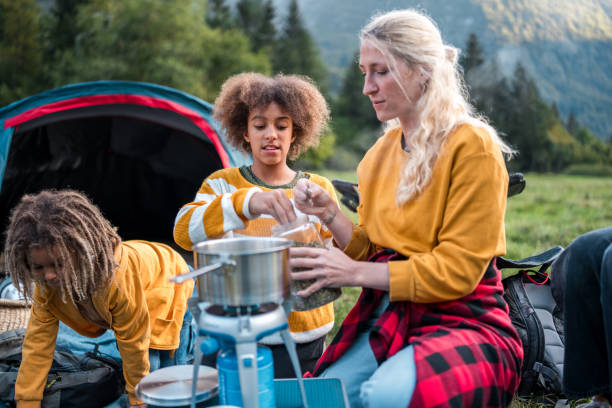 istock Family Camping Cooking Activity 2166532578