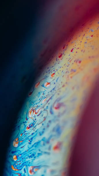 istock Defocused chemical fluid paint curve dye blend 2166540268
