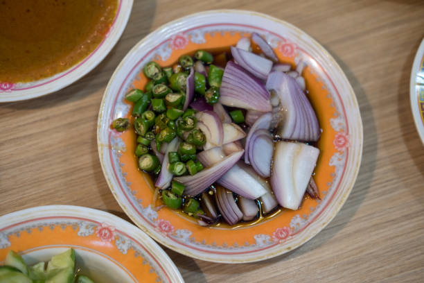 istock Ajad, or a side dish to eat with pork stew, is made from sliced cucumbers. 2166544651