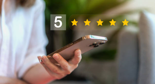 istock Customer service and satisfaction concept ,five star, customer, Business people using computer laptop happy smiley face icon, Quality assurance, give satisfaction in service. rating very impressed 2166547866