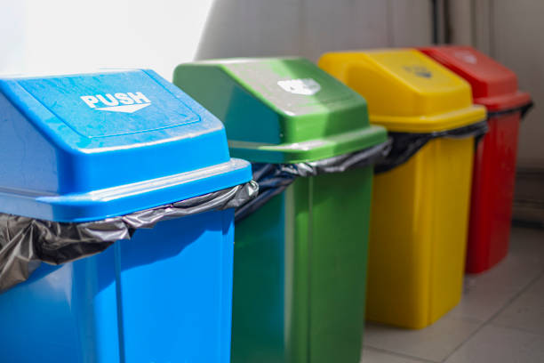 Waste Sorting Garbage for sorting trash. Colorful garbage bins. sorter machine stock pictures, royalty-free photos & images