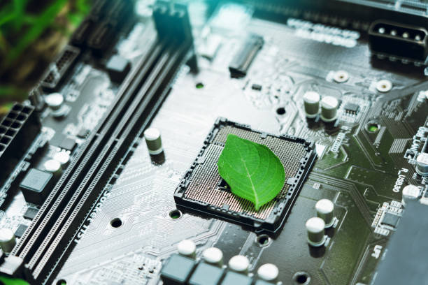 istock Green leaves inside a computer circuit board green technology and environmental technology Nature combined with digital technology. 2166551300
