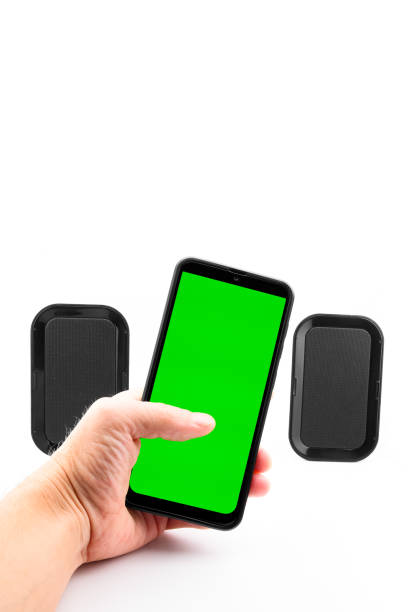 istock smartphone with green screen and stereo speakers 2166552739