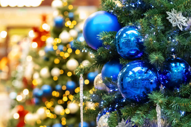 istock Christmas tree background, festive garland, illuminated ornaments, holiday celebration 2166556259