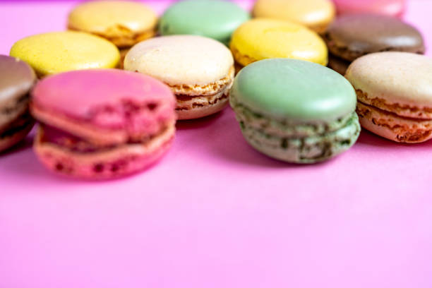 istock traditional sweets macarons from France  on solid background 2166558748