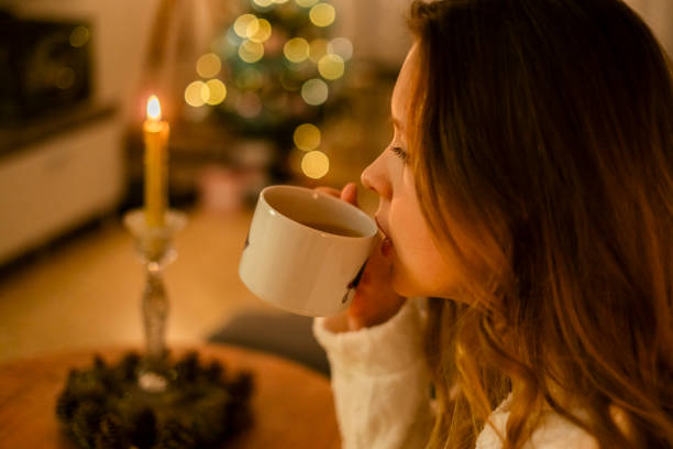 istock Girl drinking a cup of tea. 2166563230