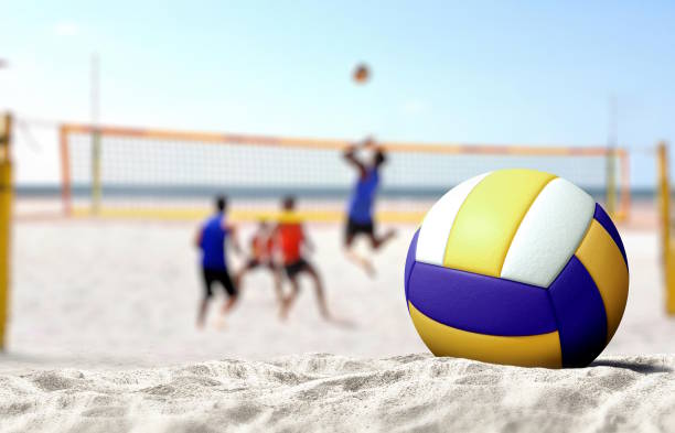 istock Volleyball game on sandy beach 2166564065