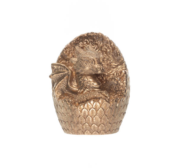 istock golden dragon egg isolated on white background 2166564942