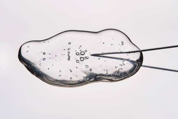 istock A drop of medicine flowing from a syringe with a needle. 2166566566