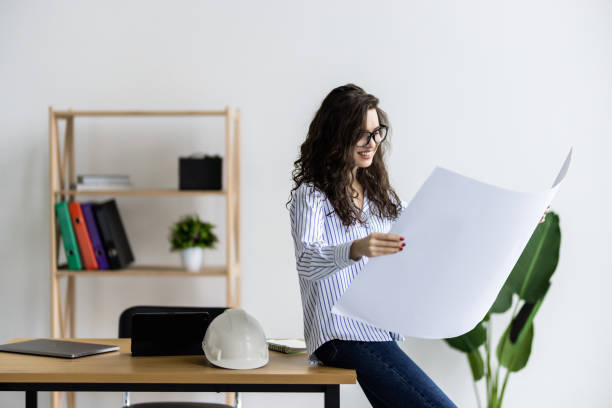 istock Young Female architect working in the office 2166567983