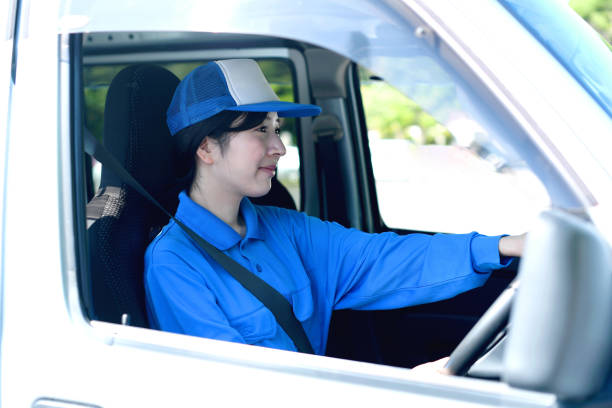 istock Asian female delivery driver driving 2166568306