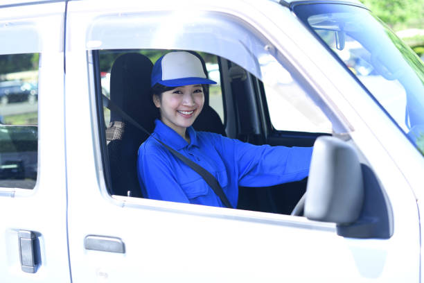 istock Asian female delivery driver driving 2166568762