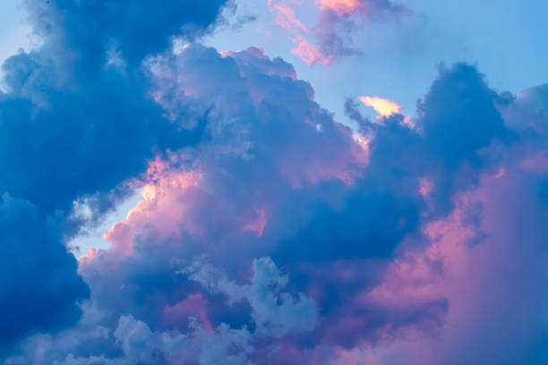 istock Beautiful cloudscape with colorful contrasting clouds at sunset before the rain. Thundercloud at sunset, abstract natural background. Storm weather. Thunderstorm. 2166571354