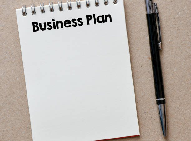 istock BUSINESS PLAN words written in an office notebook. Business concept. 2166581338