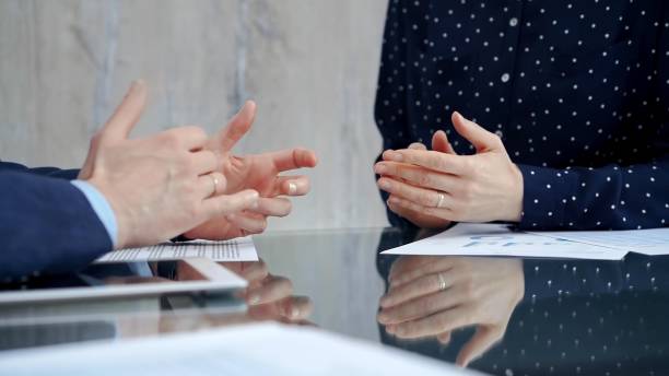 istock Unrecognizable business people shaking hands and clapping over glass table after contract signing in office. Agreement and handshake themes 2166582101