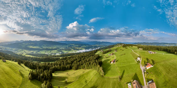 aerial panorama landscape in sunny morning light in the Bregenz Forest mountains, Vorarlberg, Austria