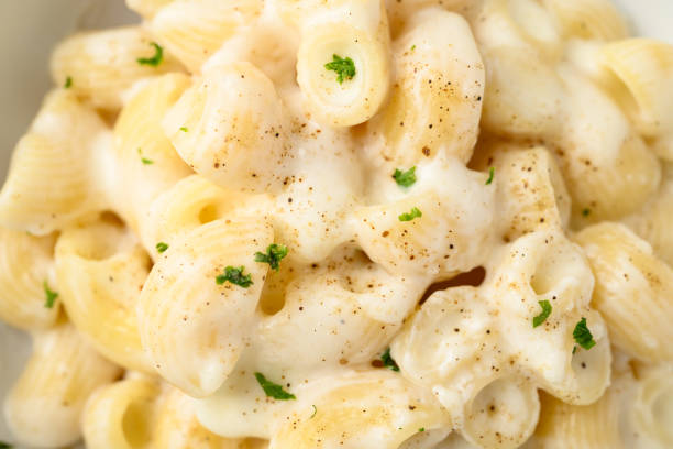 istock Macaroni cheese in bowl, Close up, Top view 2166583242