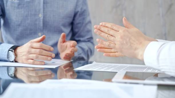 istock Unrecognizable business people clapping over glass table after c 2166583586