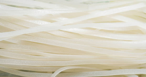 istock Wide rice noodles texture. 2166584421