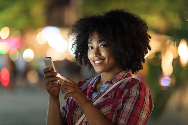istock Woman texting on phone at night 2166588179
