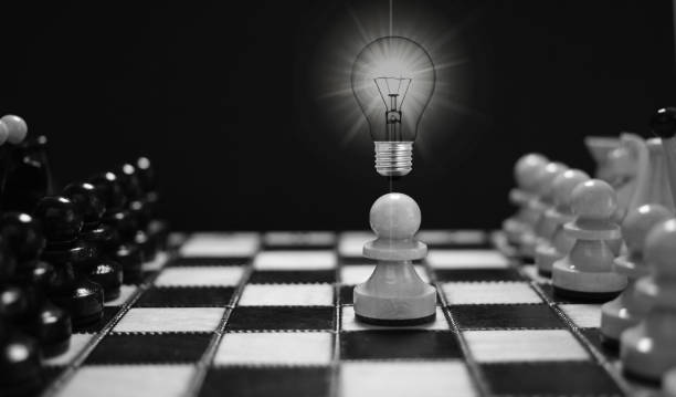 Strategic thinking and leadership concept. Chess figure in competition success play. Teamwork management. Chess pawn makes first step