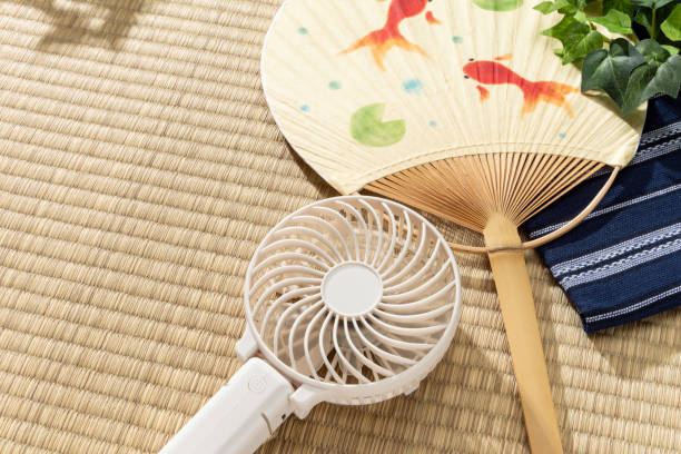 istock Portable electric fan and Japanese fan 2166592012