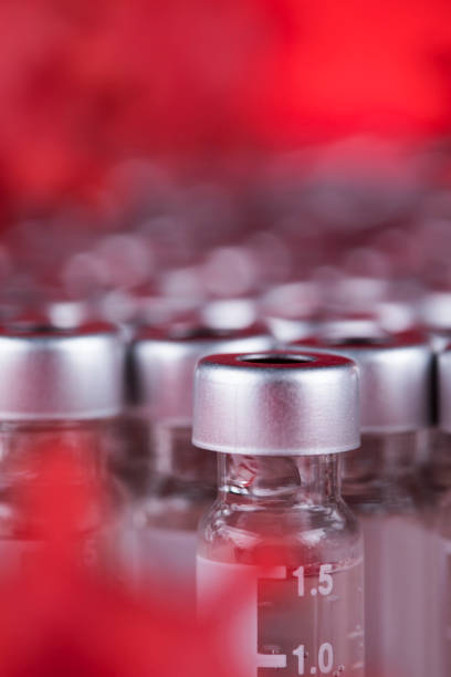 istock Bottles coronavirus vaccine, pandemic background 2166592546