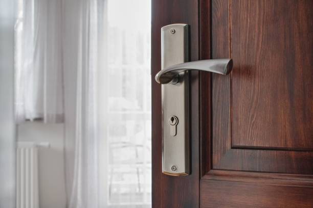 istock Half opened door into the modern cozy home interior 2166592549