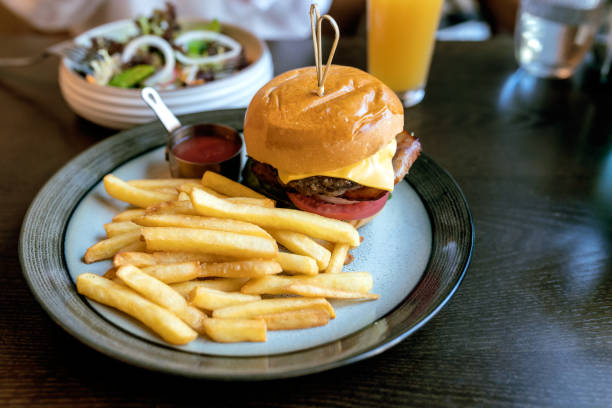 istock Burger,Close-up of burger on table 2166593528