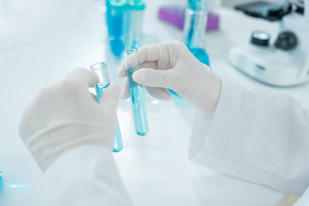 istock Scientist analyze biochemical sample in advanced scientific laboratory. Medical professional check chemical mix microbiological developmental of viral. Biotechnology research in science lab. cosmetic 2166594367