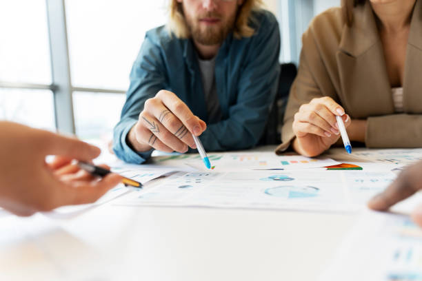 istock Business team analyzing financial data with charts and graphs 2166594383