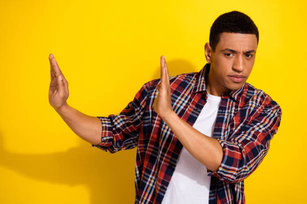 istock Photo of sad upset man wearing stylish plaid avoid news problem trouble empty space isolated on yellow color background 2166599085