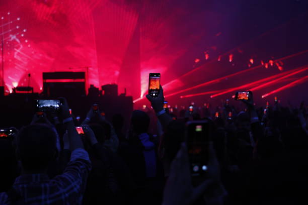 istock people having fun at the concert 2166599832