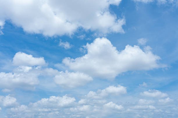 istock Bright blue sky with fluffy white clouds on a sunny day 2166603241