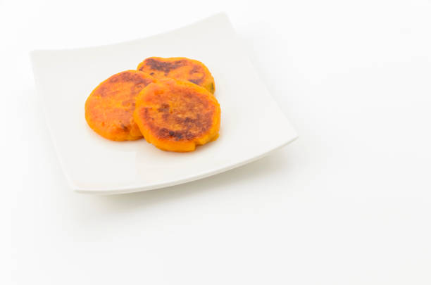 Pumpkin Mochi on white Square Plate