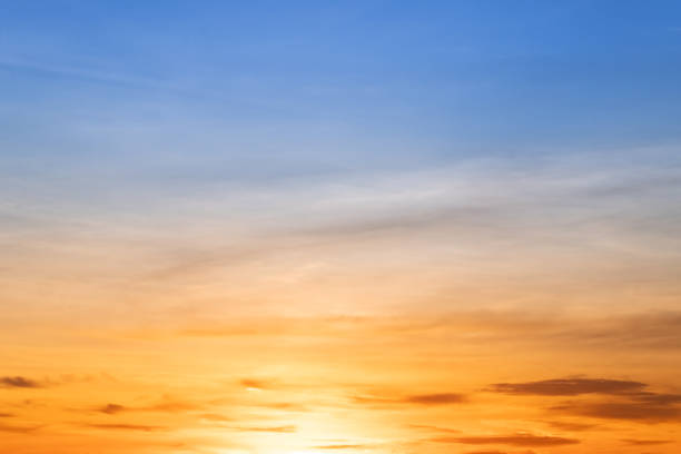 istock Beautiful , luxury soft gradient orange gold clouds and sunlight on the blue sky perfect for the background, take in everning,Twilight, Large size, high definition landscape photo 2166608137