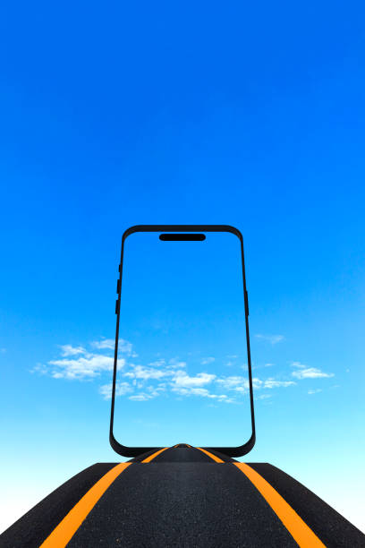 Stack of Tires on an Empty Road with Blue Sky Background