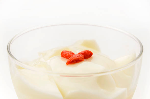 Homemade Yogurt in bowl on white wooden table