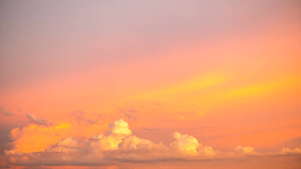istock Beautiful , luxury soft gradient orange gold clouds and sunlight on the blue sky perfect for the background, take in everning,Twilight, Large size, high definition landscape photo 2166608464