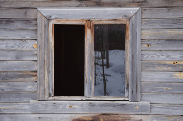istock old wooden window on wooden wall 2166608611