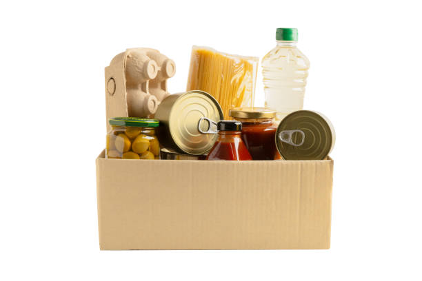 istock Foodstuff for donation isolated on white background with clipping path, storage and delivery. Various food, pasta, cooking oil and canned food. 2166608728