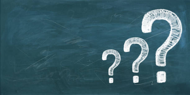 istock Chalkboard with three large question marks in white chalk on a green background. 2166610048