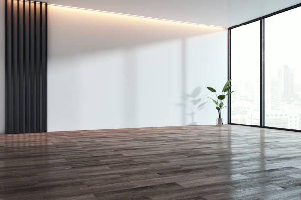 istock Modern empty room with large windows and wooden flooring. 3D Rendering 2166610174