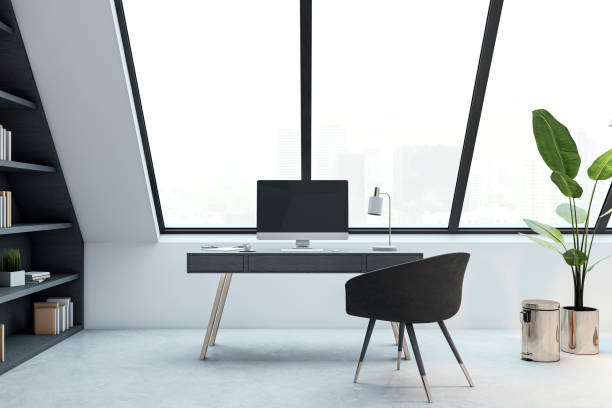 istock Modern home office with desk, chair, and computer by large window. 3D Rendering 2166610285