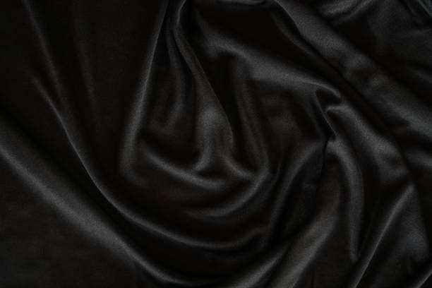Black background of black cloth texture can be use as background