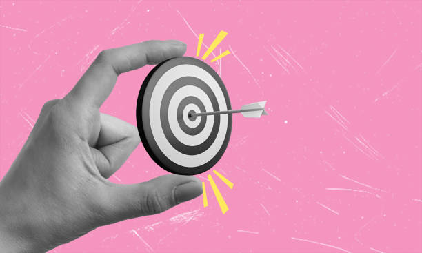 istock Contemporary art collage art depicting a hand holding a target. 2166617241